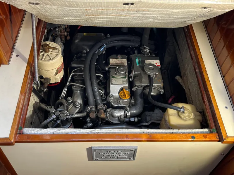 Slide: The Image of Engine compartment of a 2006 Shannon Shoalsailer, showcasing detailed mechanical components. - 18