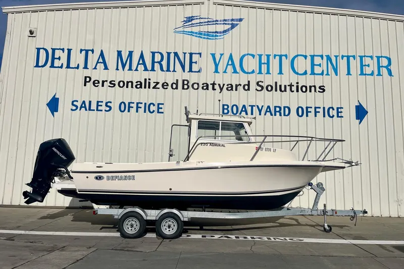 The Image of 2023 Defiance Admiral 220 EX boat on trailer at Delta Marine Yacht Center. - 0