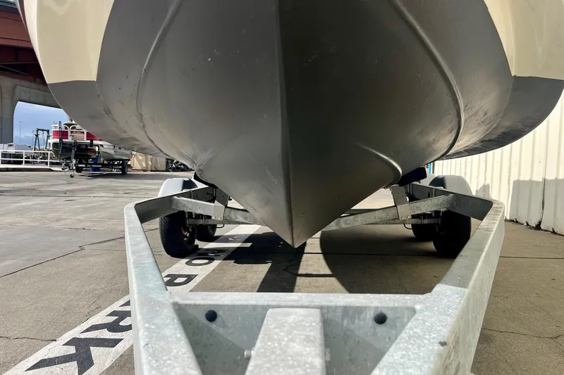 Slide: The Image of 2023 Defiance Admiral 220 EX boat on trailer, viewed from below. - 3