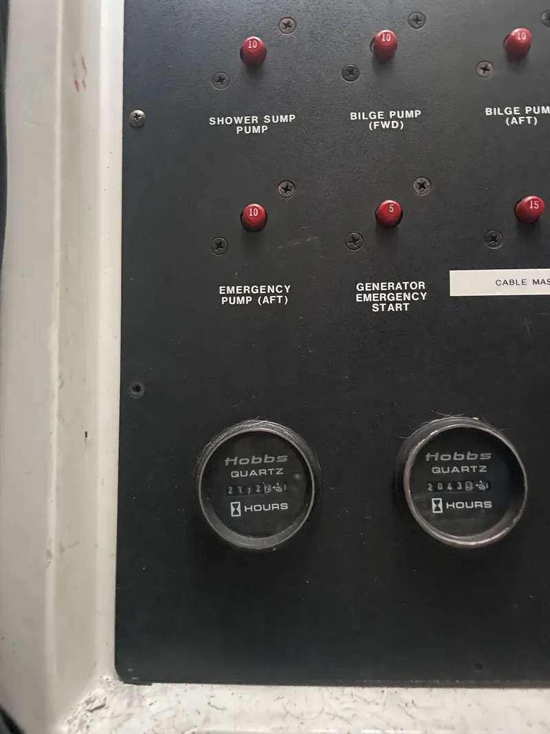 Slide: The Image of Control panel of a 1991 Sea Ray Sun Dancer 480 Express boat. - 15