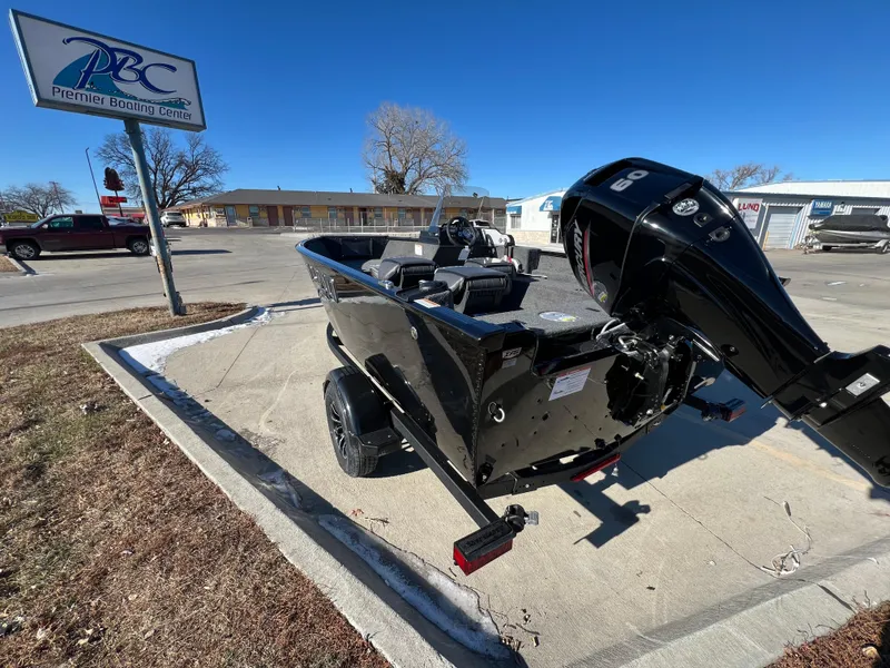 Slide: The Image of 2025 Lund 1650 Rebel XL SS boat on trailer at Premier Boating Center. - 4