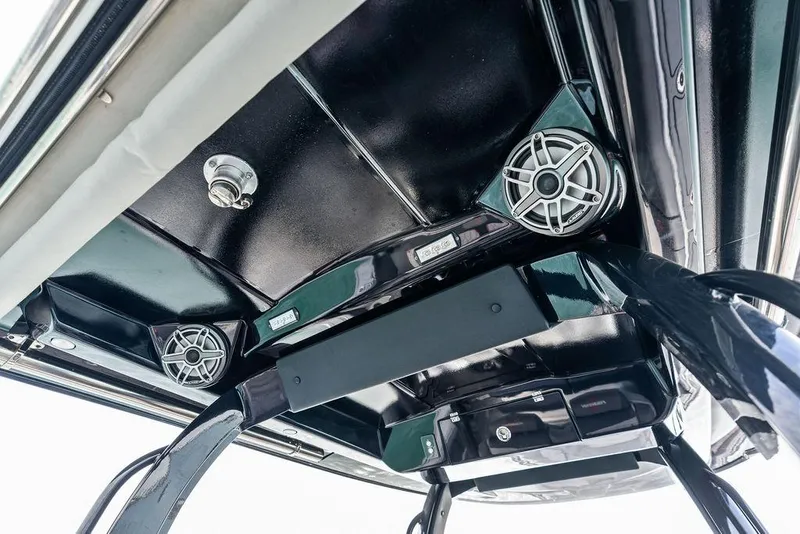 Slide: The Image of 2021 Fountain 39 NX boat speakers and lighting on black overhead panel. - 16