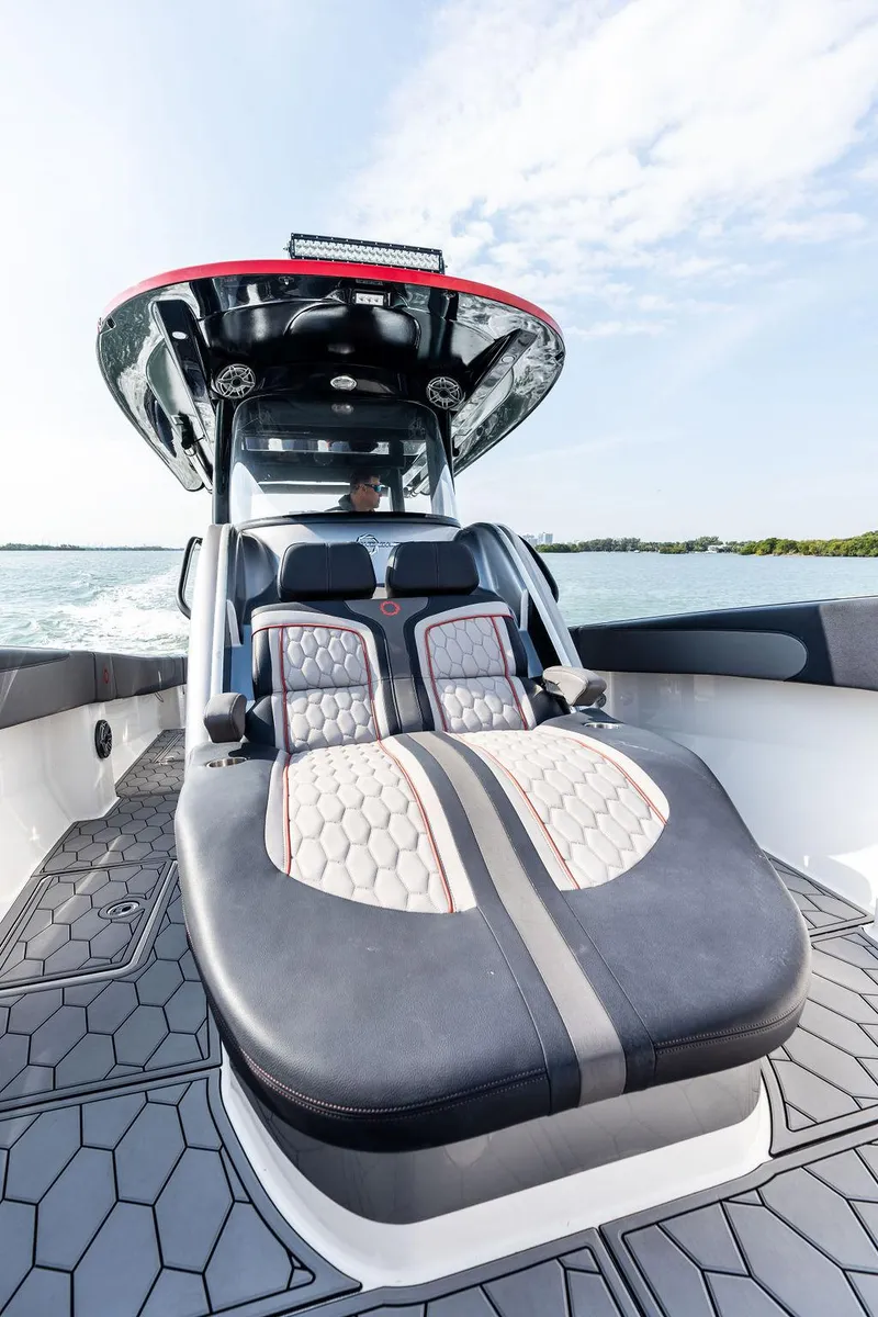 Slide: The Image of 2021 Fountain 39 NX boat interior with luxurious seating and modern design on open water. - 20