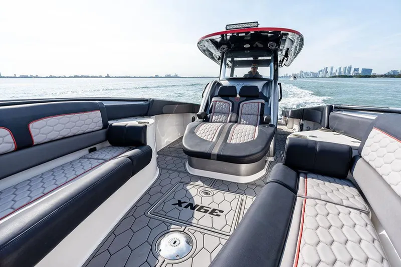Slide: The Image of 2021 Fountain 39 NX boat interior with luxurious seating and modern design on open water. - 18
