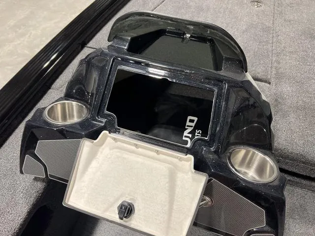 Slide: The Image of 2025 Lund 2075 Pro-V Bass XS console with cup holders and storage compartment. - 15