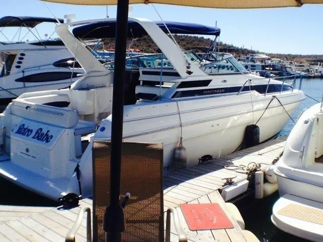 Slide: The Image of 1995 Wellcraft 3600 Martinique yacht docked at marina. - 19