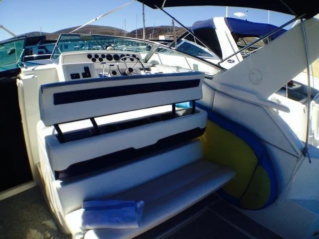 Slide: The Image of 1995 Wellcraft 3600 Martinique boat interior with seating and control panel. - 21