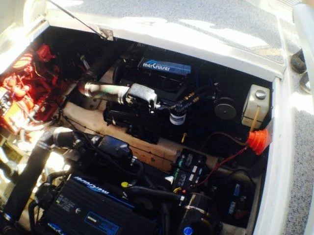 Slide: The Image of Engine compartment of a 1995 Wellcraft 3600 Martinique boat with MerCruiser engines. - 33
