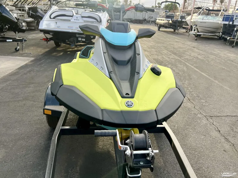 Slide: The Image of 2025 Yamaha WaveRunner Jet Blaster Pro-3 on trailer in marina setting. - 2