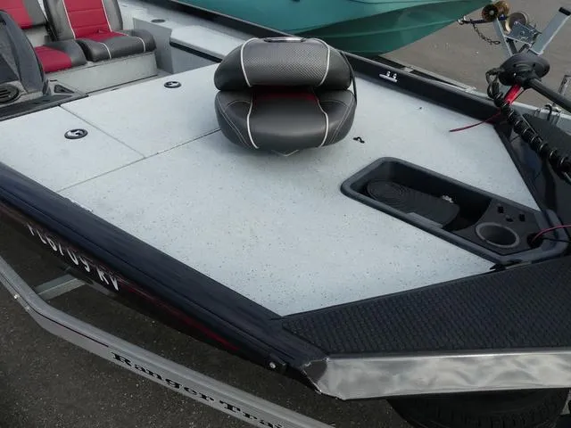 Slide: The Image of 2018 Ranger RT178 boat deck with seating and storage compartments. - 14