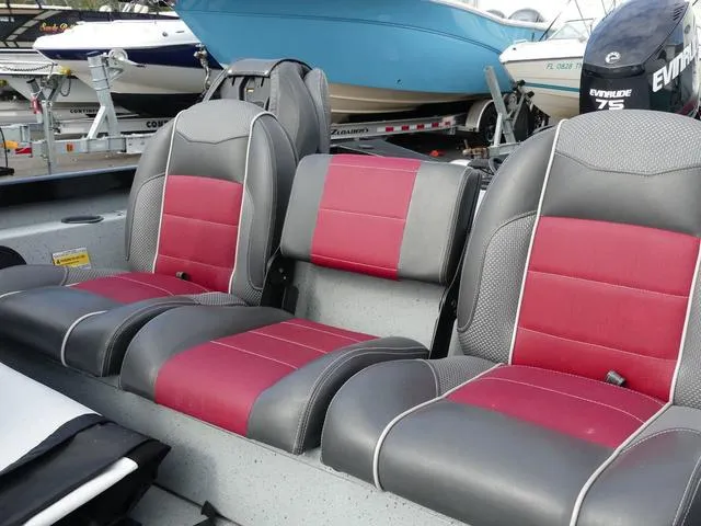 Slide: The Image of 2018 Ranger RT178 boat seats with red and gray upholstery. - 16