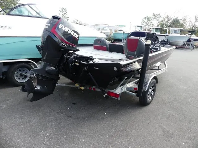Slide: The Image of 2018 Ranger RT178 boat with Evinrude motor on trailer, parked in marina. - 6