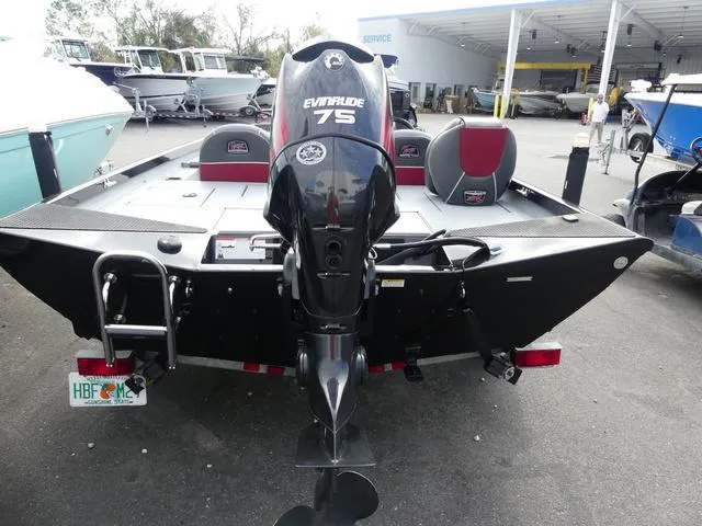 Slide: The Image of 2018 Ranger RT178 boat with Evinrude 75 engine at a marina. - 7