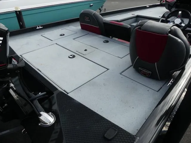 Slide: The Image of 2018 Ranger RT178 boat interior with storage compartments and seating. - 9