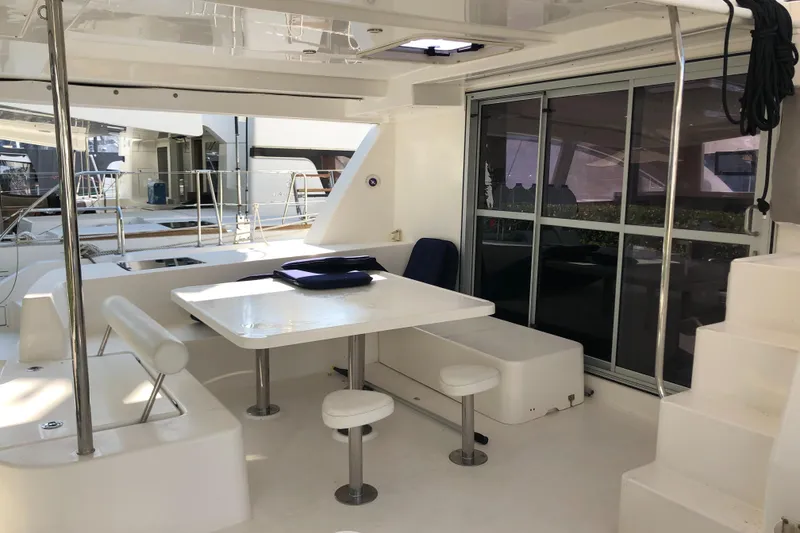 Slide: The Image of Spacious deck area of 2017 Leopard 48 yacht with seating and table. - 10