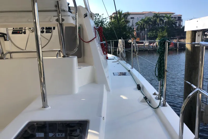 Slide: The Image of Deck view of 2017 Leopard 48 yacht docked by waterfront. - 6