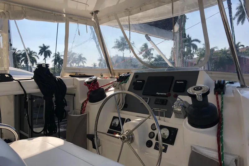 Slide: The Image of Interior view of 2017 Leopard 48 yacht cockpit with steering wheel and navigation equipment. - 8