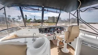 Slide: The Image of Interior view of 2016 Meridian 391 Sedan yacht cockpit with modern controls. - 18