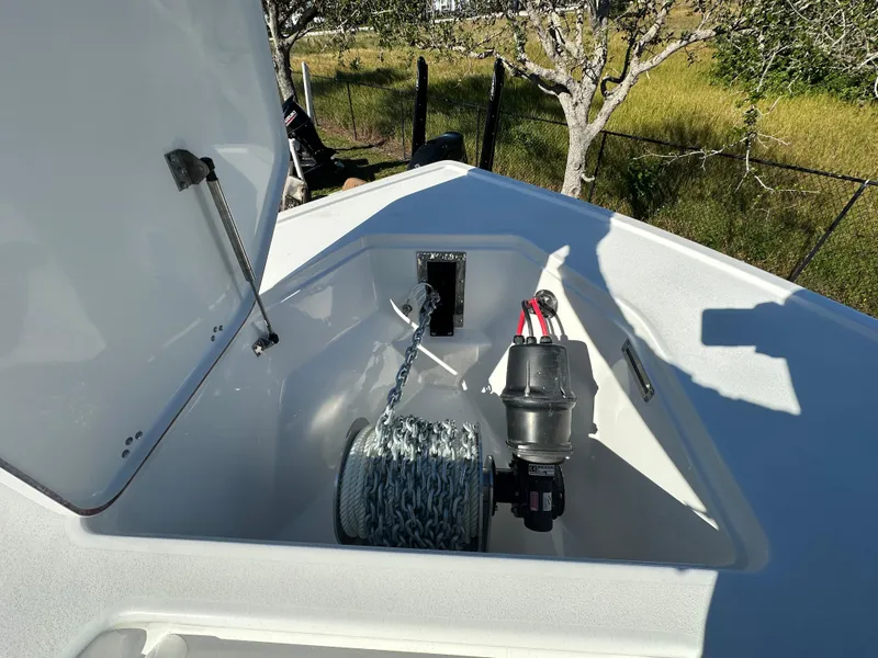 Slide: The Image of 2025 Sea Pro 322 Offshore anchor locker with chain and winch system. - 10