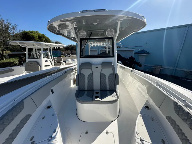 Slide: The Image of 2025 Sea Pro 322 Offshore boat, sleek design, spacious seating, modern features. - 11