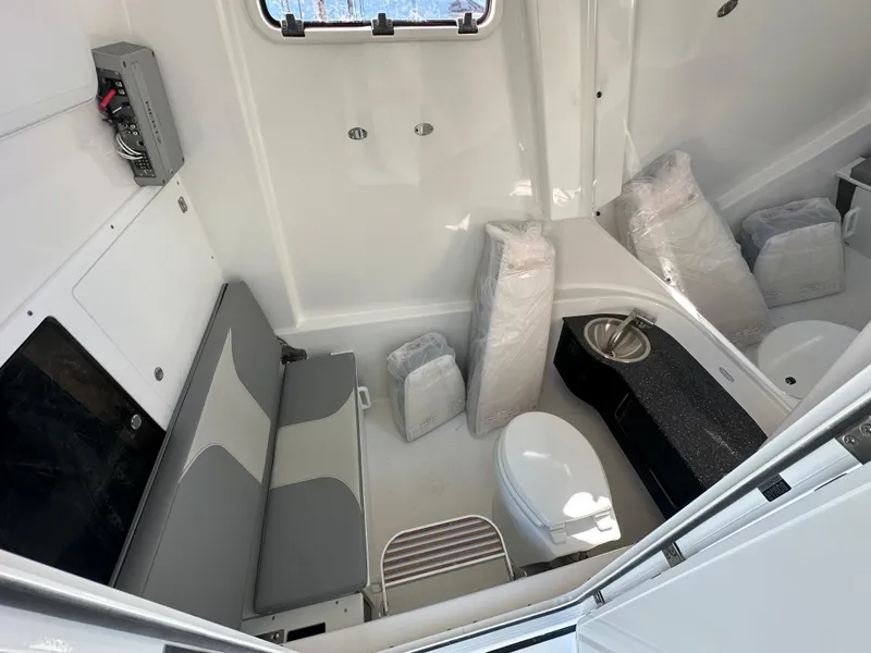 Slide: The Image of Interior of 2025 Sea Pro 322 Offshore boat with seating and toilet. - 8