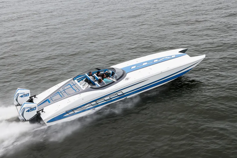 Slide: The Image of 2022 MTI 390X speedboat cruising on water, featuring sleek design and powerful engines. - 4