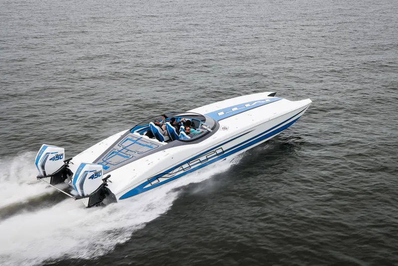 Slide: The Image of 2022 MTI 390X speedboat cruising on open water, featuring sleek design and powerful engines. - 5