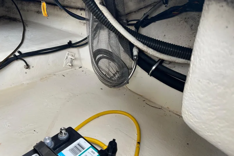 Slide: The Image of 2011 Chaparral Sunesta 244 Xtreme boat interior wiring and battery setup. - 23