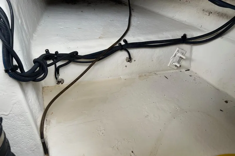 Slide: The Image of 2011 Chaparral Sunesta 244 Xtreme interior wiring and compartment view. - 24