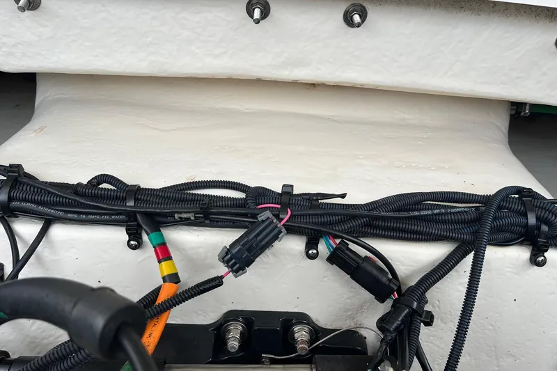Slide: The Image of Wiring and connectors on a 2011 Chaparral Sunesta 244 Xtreme boat. - 25
