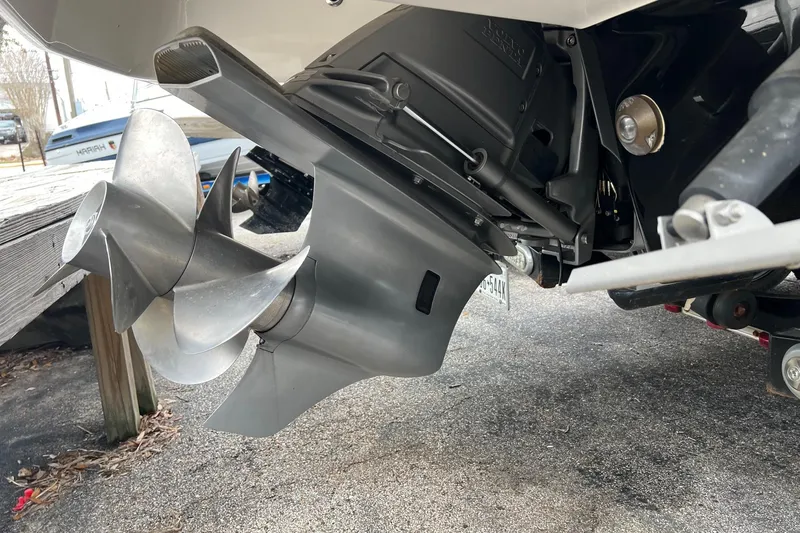 Slide: The Image of 2011 Chaparral Sunesta 244 Xtreme boat propeller and outdrive close-up. - 29