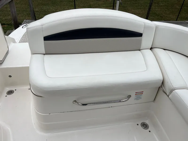Slide: The Image of 2011 Chaparral Sunesta 244 Xtreme boat seating, white leather upholstery, sleek design. - 6