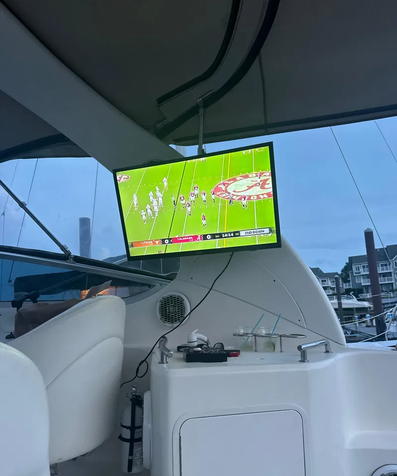 Slide: The Image of Television showing football game on 2002 Sea Ray Sundancer yacht. - 9