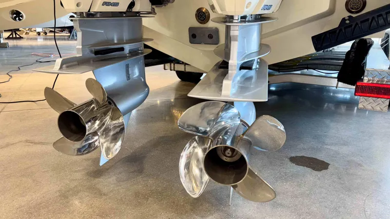 Slide: The Image of 2024 Chris-Craft Calypso 32 CT boat propellers in a showroom setting. - 3