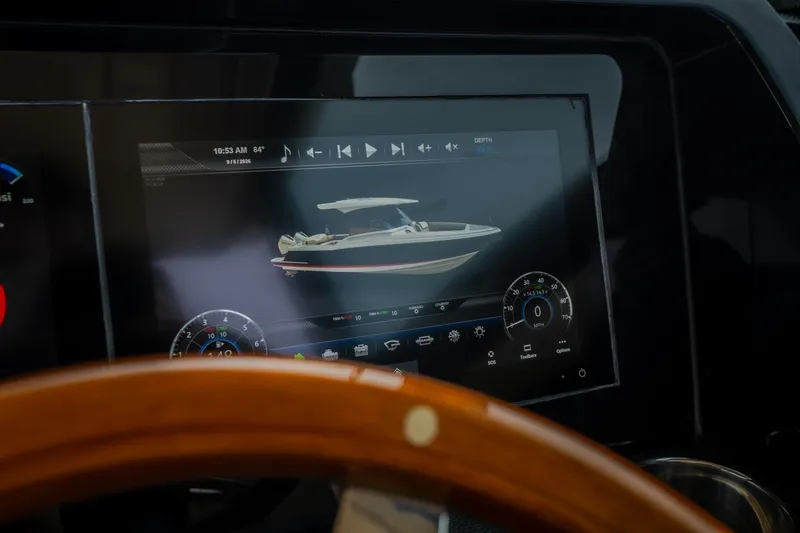 Slide: The Image of 2024 Chris-Craft Calypso 32 dashboard display with boat interface and controls. - 37