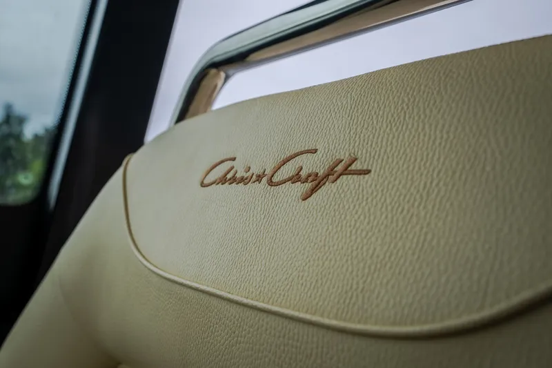 Slide: The Image of Luxurious interior detail of 2024 Chris-Craft Calypso 32 boat with elegant leather upholstery. - 38