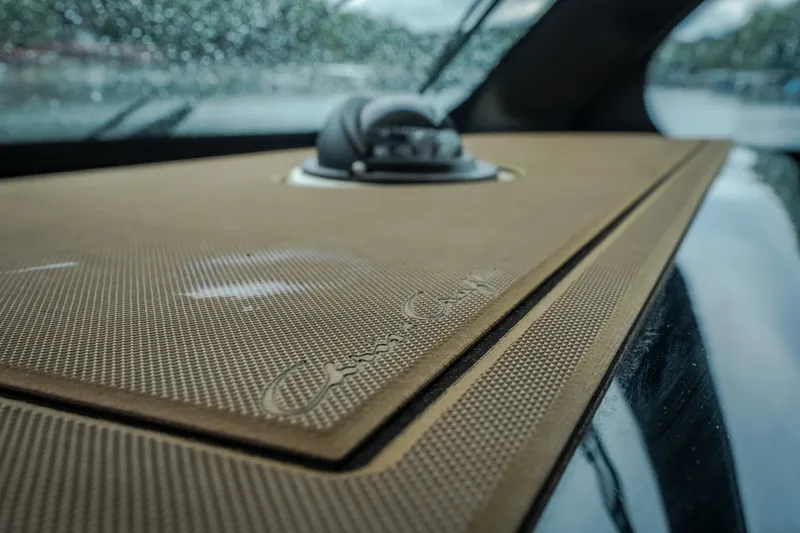 Slide: The Image of 2024 Chris-Craft Calypso 32 dashboard detail with elegant textured surface. - 42