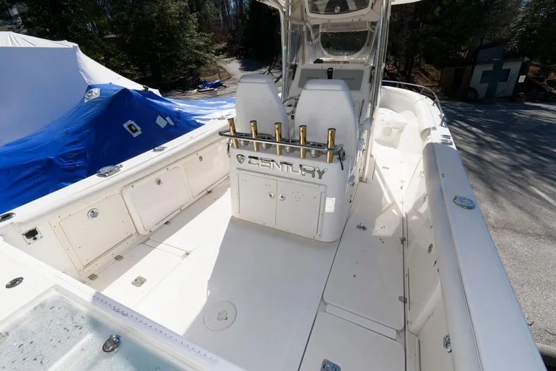 Slide: The Image of 2008 Century 2901 Center Console boat with spacious deck and fishing rod holders. - 3