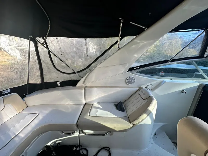 Slide: The Image of Interior of 2013 Sea Ray 280 Sundancer boat with seating and canopy. - 3