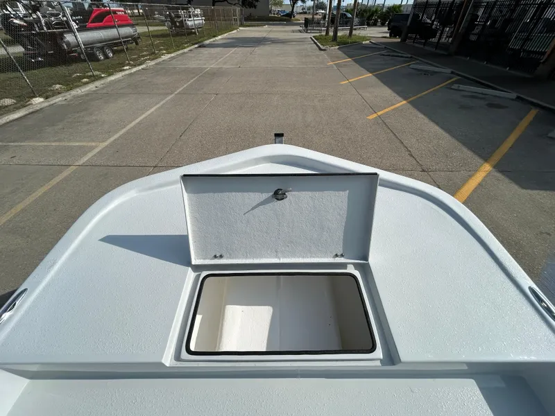 Slide: The Image of Shallow Stalker Cat 204 boat deck with open storage compartment, 2025 model. - 10