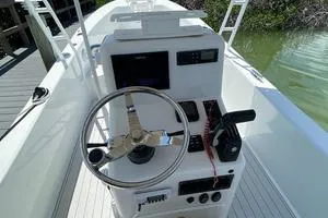 Slide: The Image of 2006 Andros Tarpon boat console with steering wheel and controls. - 8