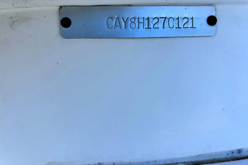 Slide: The Image of 2021 Caymas 28 HB boat identification plate with serial number. - 35