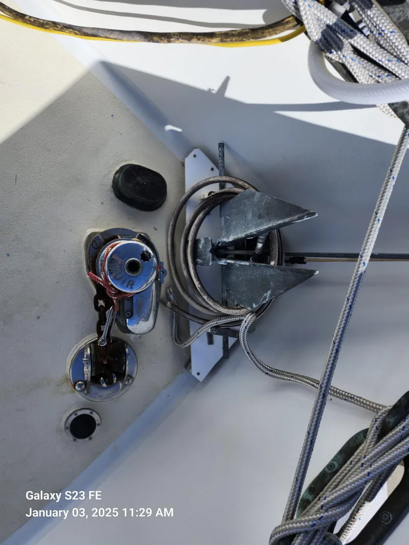 Slide: The Image of Anchor and winch system on 1988 Lord Nelson Victory 37 sailboat deck. - 16