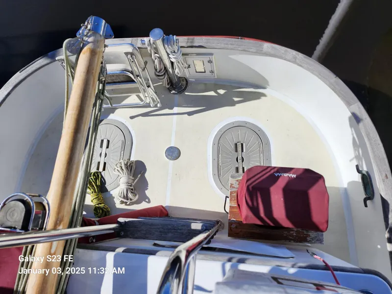 Slide: The Image of Cockpit of 1988 Lord Nelson Victory 37 sailboat with ropes and equipment. - 23