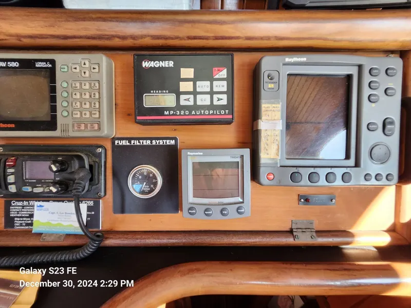 Slide: The Image of Control panel of a 1988 Lord Nelson Victory 37 yacht with navigation instruments. - 33