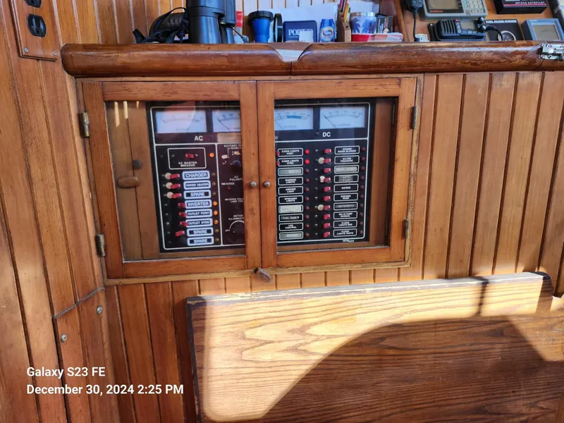 Slide: The Image of Wooden control panel on a 1988 Lord Nelson Victory 37 boat. - 35