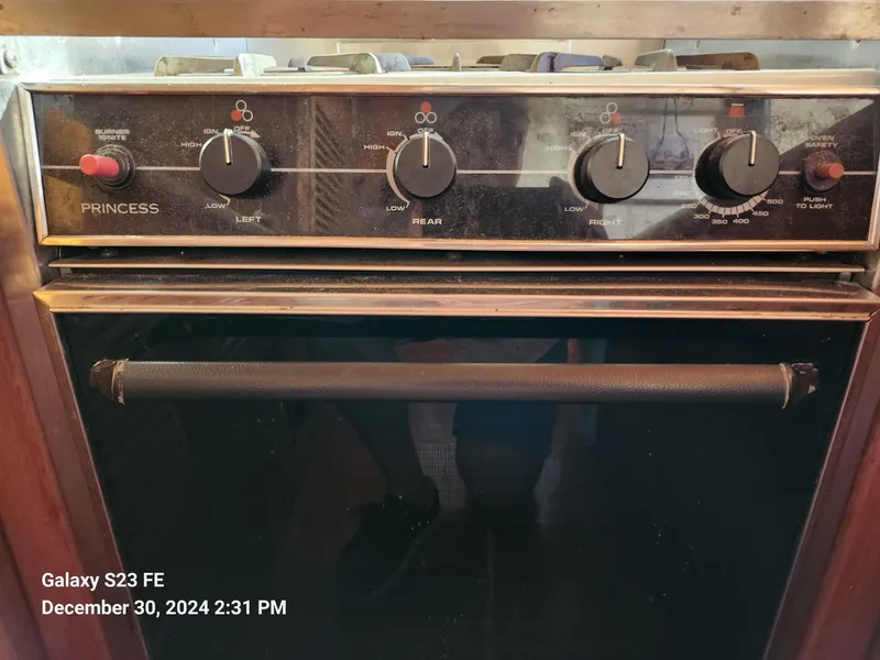 Slide: The Image of Vintage Lord Nelson Victory 37 stove, 1988 model, with control knobs and oven door. - 41