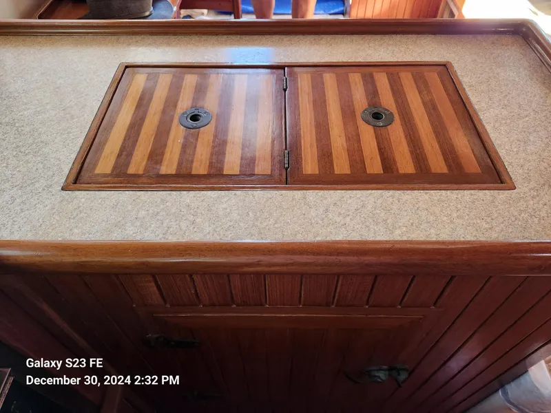 Slide: The Image of Wooden countertop with striped paneling on a 1988 Lord Nelson Victory 37 yacht. - 43