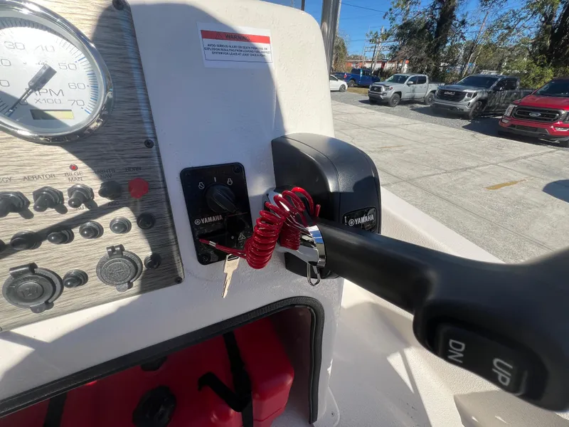 Slide: The Image of Dashboard of 2025 Carolina Skiff E 16 JVX boat with Yamaha controls. - 11