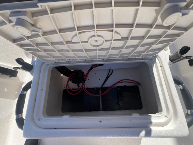 Slide: The Image of Open storage compartment in 2025 Carolina Skiff E 16 JVX boat. - 15